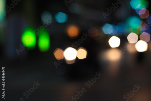 Boogie and night lights dark background.Defocused abstract blur