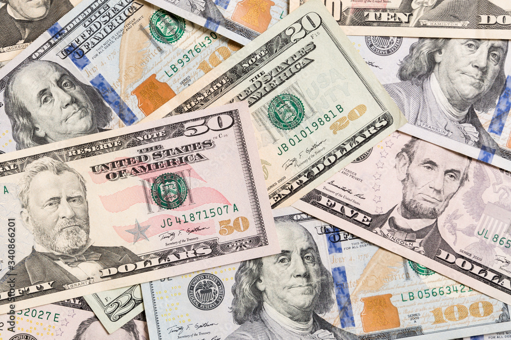 US Dollar bills. one hundred dollar bills background. Top view of business concept on background with copy space US Dollar bills. one hundred dollar bills background. Top view of business concept on background with copy space