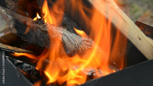 Firewood burns hot in the hearth