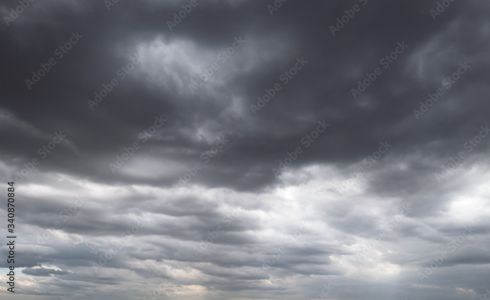 Dark storm clouds before rain used for climate background. Clouds become dark gray before raining. Dark storm clouds before rain used for climate background. Clouds become dark gray before raining.