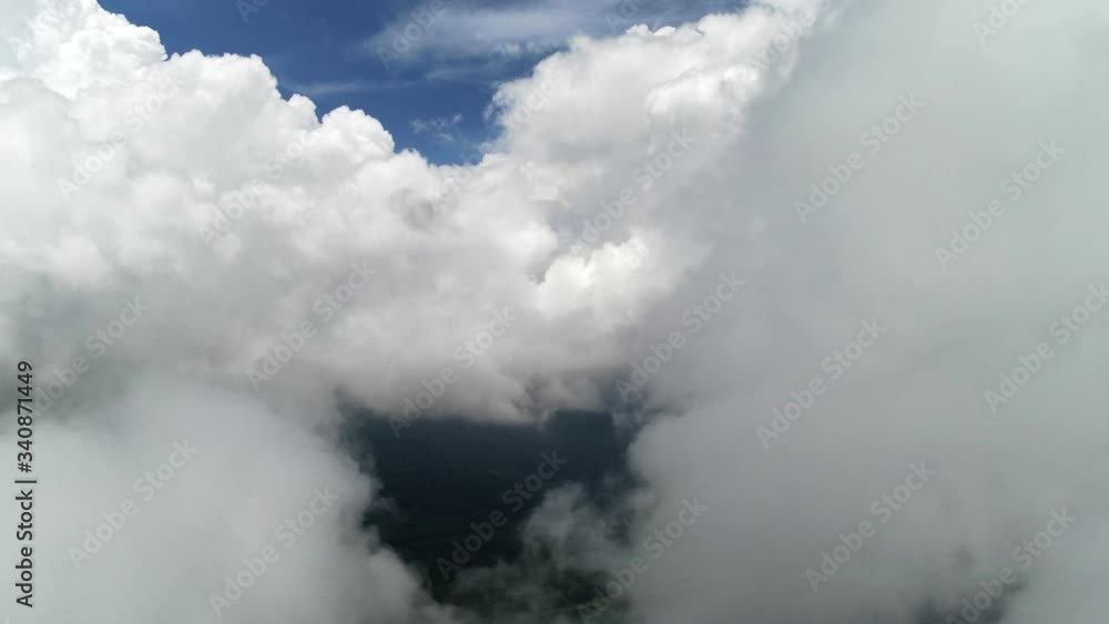 High altitude flight through clouds in Bali, Indonesia High altitude flight through clouds in Bali, Indonesia