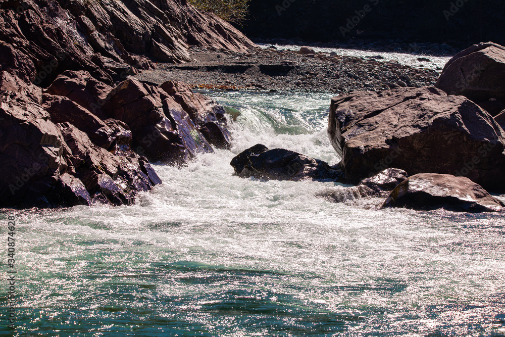 Flowing water of mountain river Flowing water of mountain river