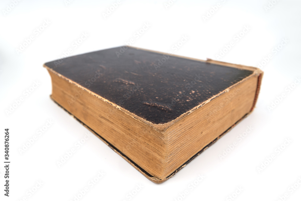 Old shabby and worn book on clean white background Old shabby and worn book on clean white background