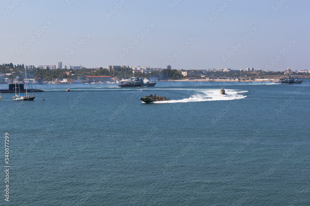 Raptor landing craft maneuvers at the celebration of the Navy Day in Sevastopol Bay, Crimea Raptor landing craft maneuvers at the celebration of the Navy Day in Sevastopol Bay, Crimea