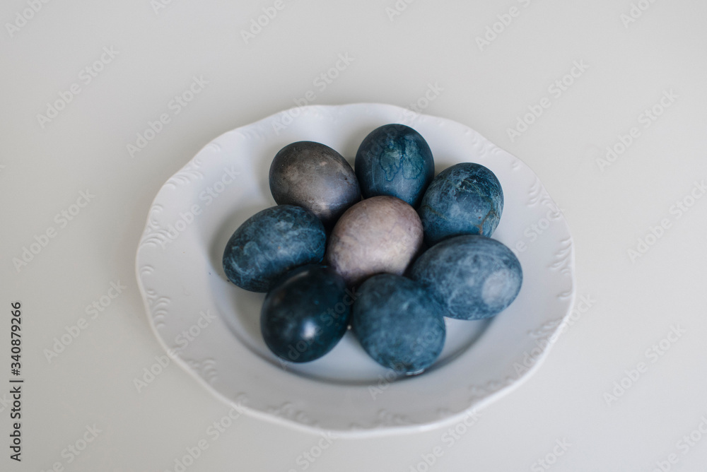 Easter blue eggs with cotton on the table Easter blue eggs with cotton on the table