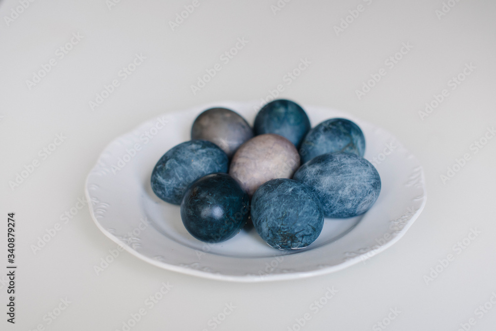 Easter blue eggs with cotton on the table Easter blue eggs with cotton on the table