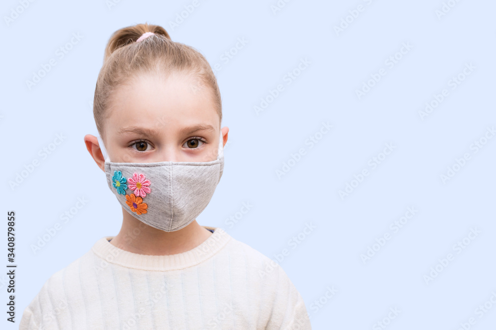 Girl with handmade mask to protect her from Corona virus. Corona virus pandemic.