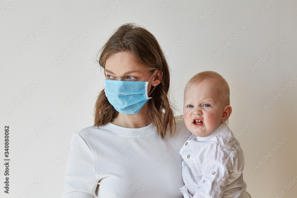 Mother and sun in medical mask