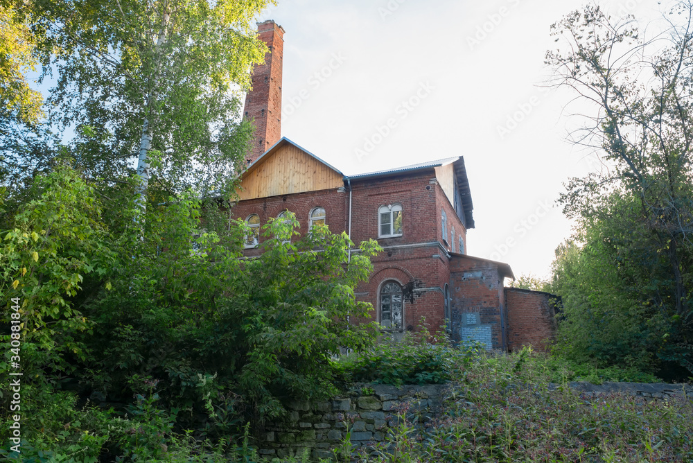 House with a chimney on a high hill in the park House with a chimney on a high hill in the park