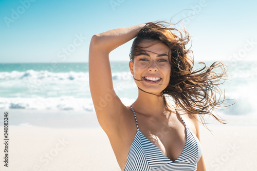 Happy beautiful woman enjoy vacation at beach