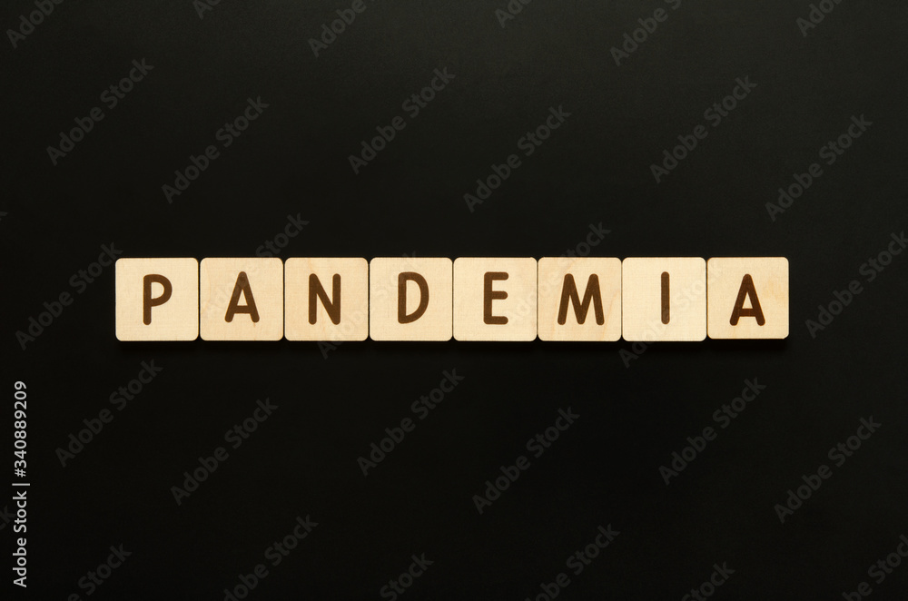 PANDEMIA - word from wooden blocks with letters. Top view on black background. - Image PANDEMIA - word from wooden blocks with letters. Top view on black background. - Image