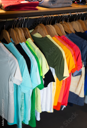 Men clothes in modern garments shop