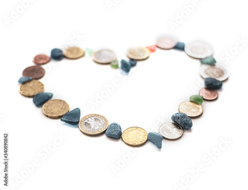 European Union signl made of coins of European countries, heart made of coins