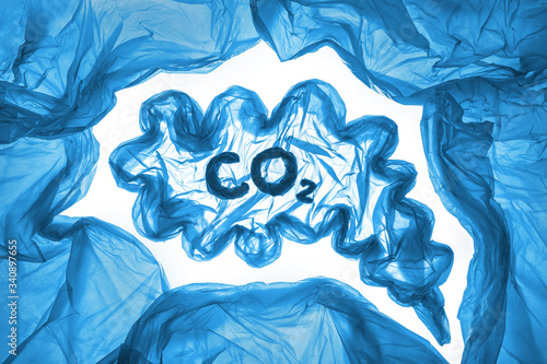 Concept of air, nature and planet pollution by garbage. Carbon dioxide overabundant photo