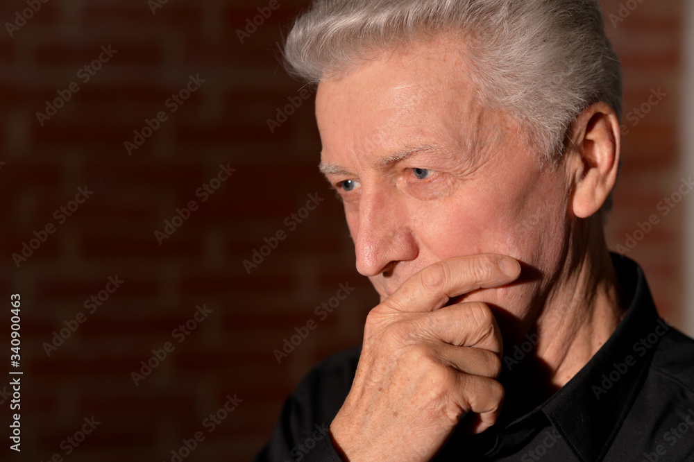 Close up portrait of thoughtful senior man Close up portrait of thoughtful senior man