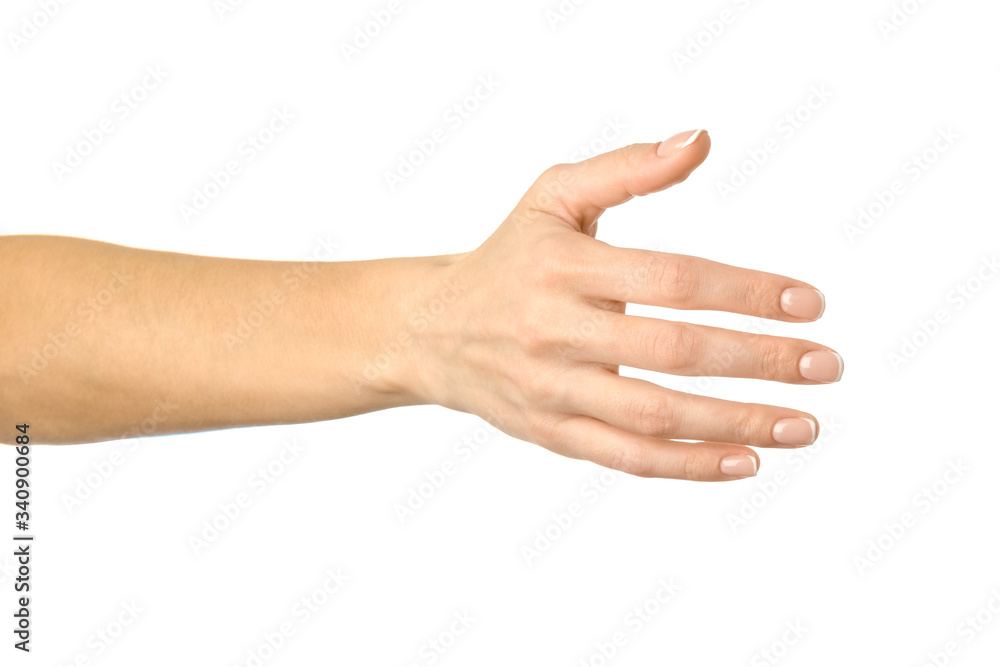 Giving hand for handshake. Woman hand gesturing isolated on white