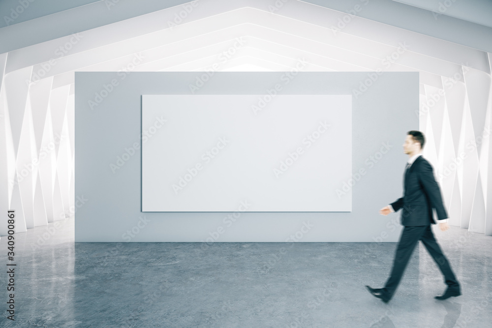 Businessman and blank poster Businessman and blank poster