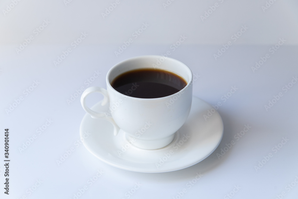 Cup of coffee on white background