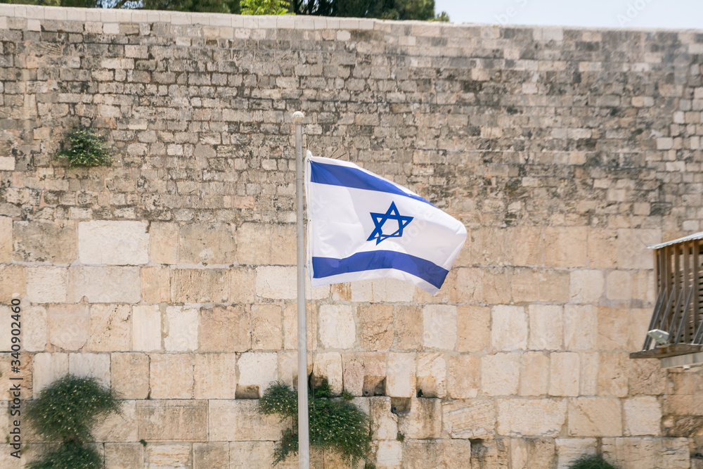 Israel-Flag in front of the Western Wall