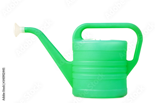 Green watering can isolated on white background. Garden