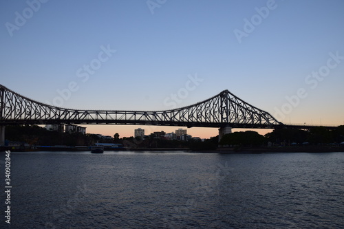 bridge over river at dawn