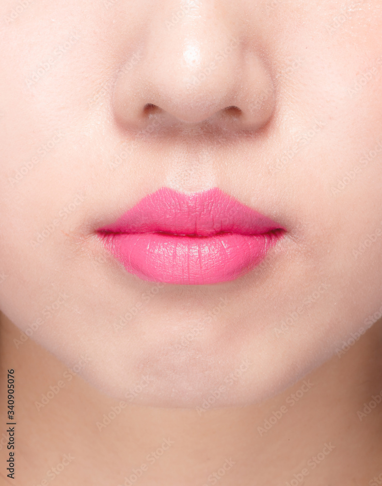 a woman with pink lips.