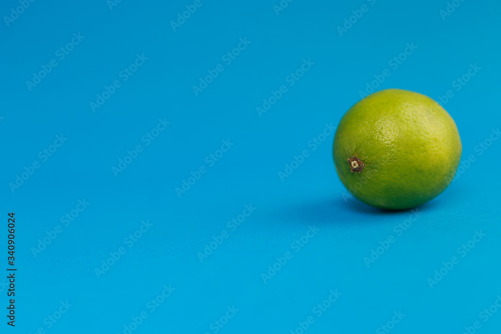 green lemon-lime on a blue background