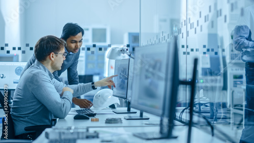 Inside Office: Digital Engineering Professional Working on Personal Computer, Designing 3D Component in CAD SoftwareIn Factory Workshop.