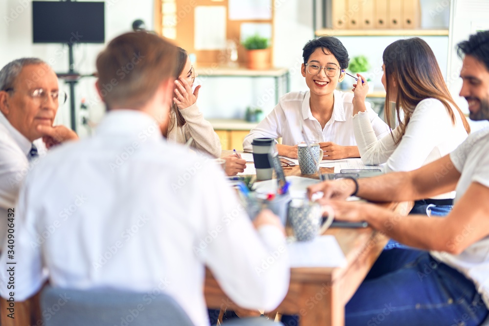 Group of business workers working together at the office