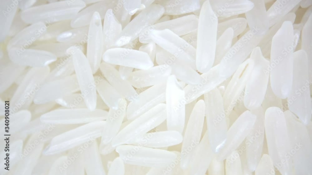 Jasmine plain white rice. Rotating macro close up shot. Jasmine plain white rice. Rotating macro close up shot.