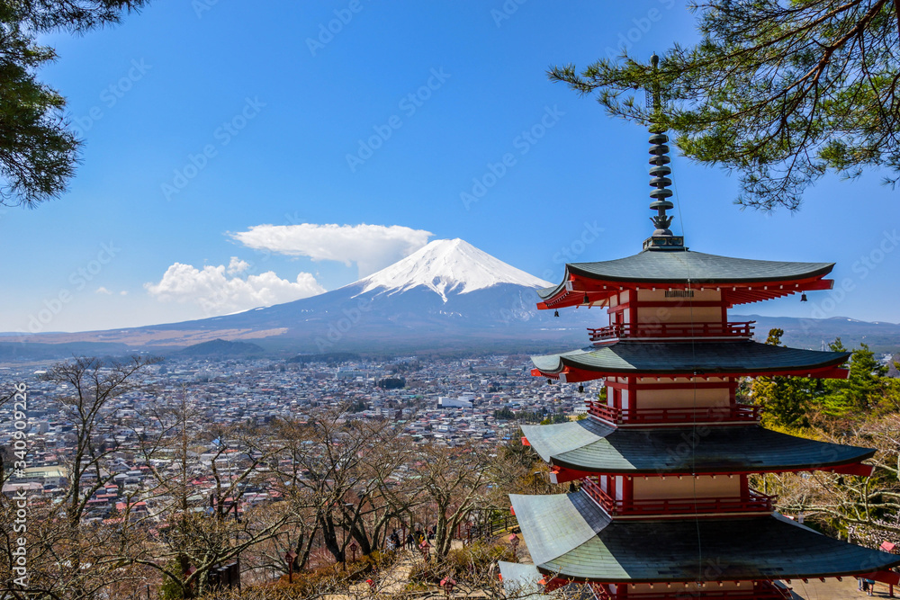 Stunning view on the snowy mount Fuji with pagoda in Japan