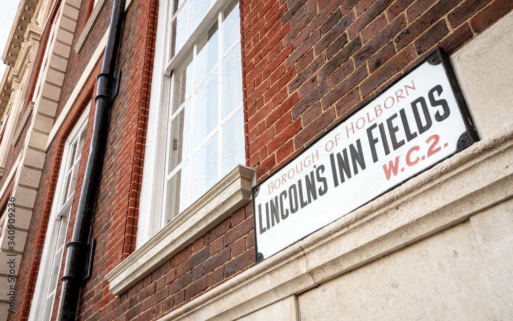 Fototapeta premium Lincoln's Inn Fields, London WC2. A street sign in the heart of London's historic legal district. 