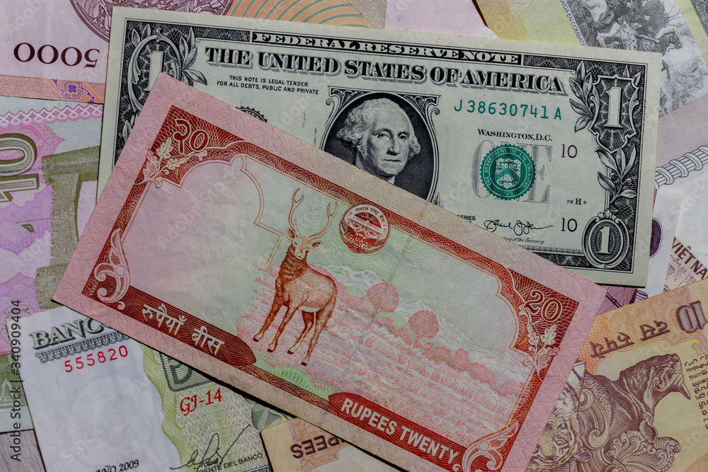 One US Dollar with Different Nepalese Rupee Banknotes Stock Photo