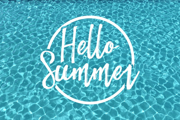 Clear blue swimming pool background with hello summer message