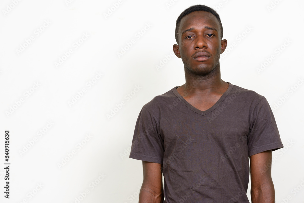 Portrait of young African man looking at camera Portrait of young African man looking at camera