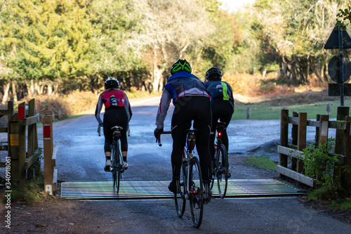 A group of cyclists riding their bikes on country roads