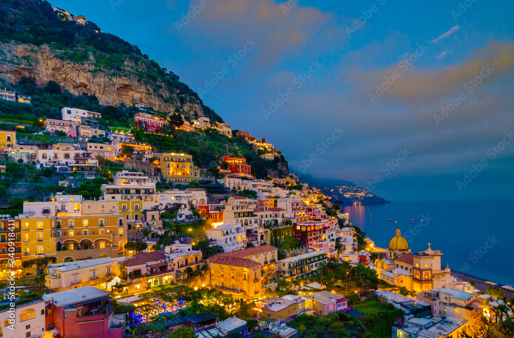 Sunset view of the town of Positano at  Amalfi Coast, Italy.
