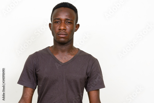 Portrait of stressed young African man looking angry