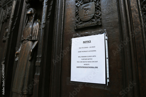 Cover-19 sign on church door