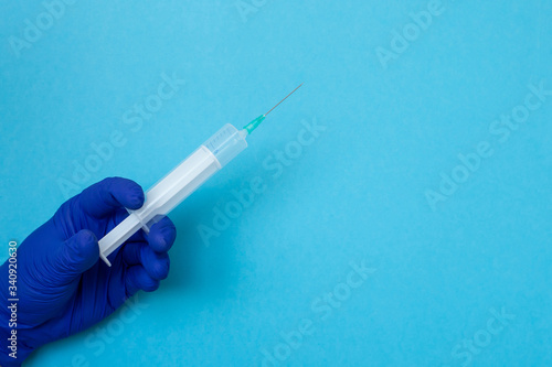 Doctor Hand Holding Syringe with Medicine Vaccine for Cure the Disease sickness ill, coronavirus, illness, infection, quarantine,