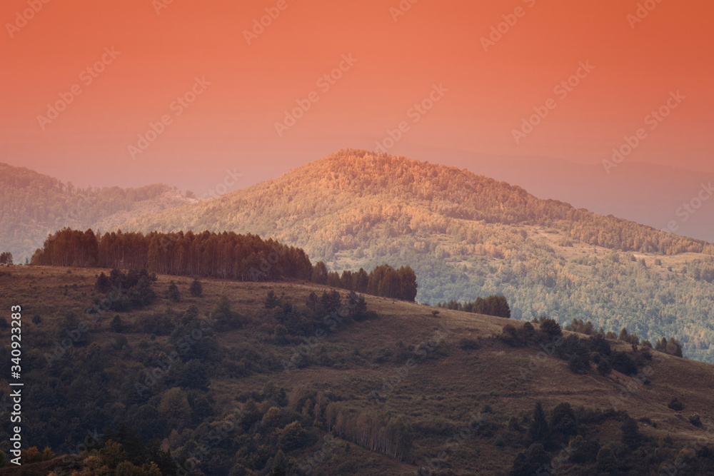 hills and mountains in sunset light, autumn landscape