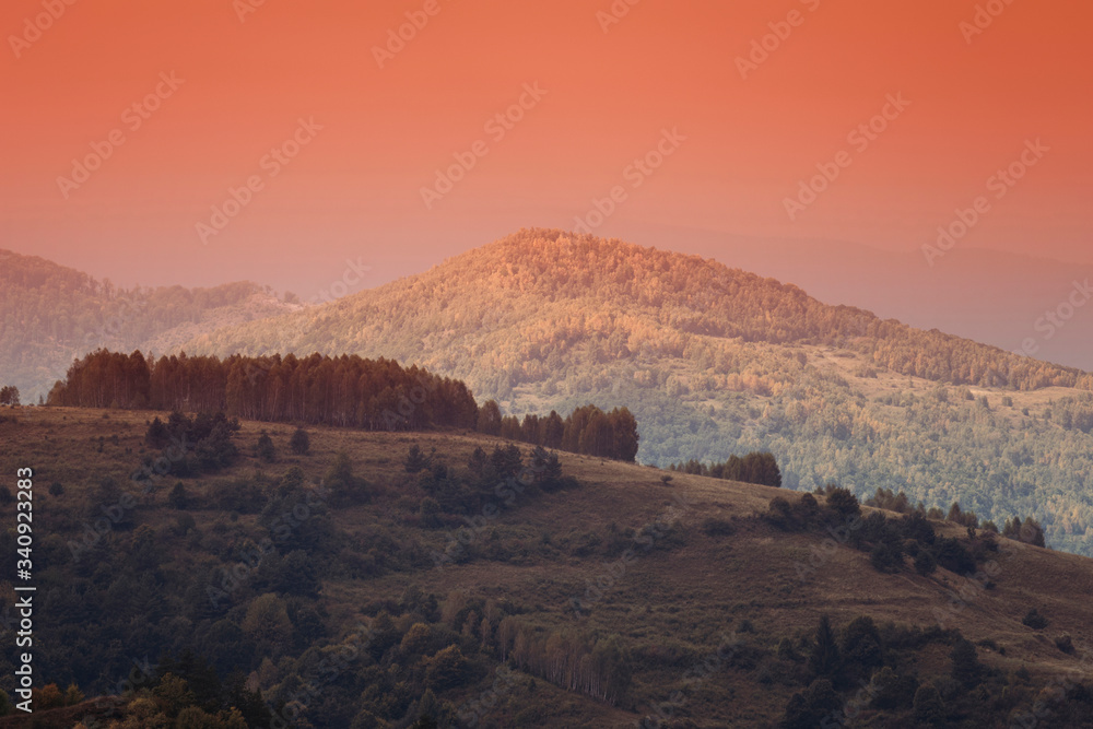 hills and mountains in sunset light, autumn landscape hills and mountains in sunset light, autumn landscape