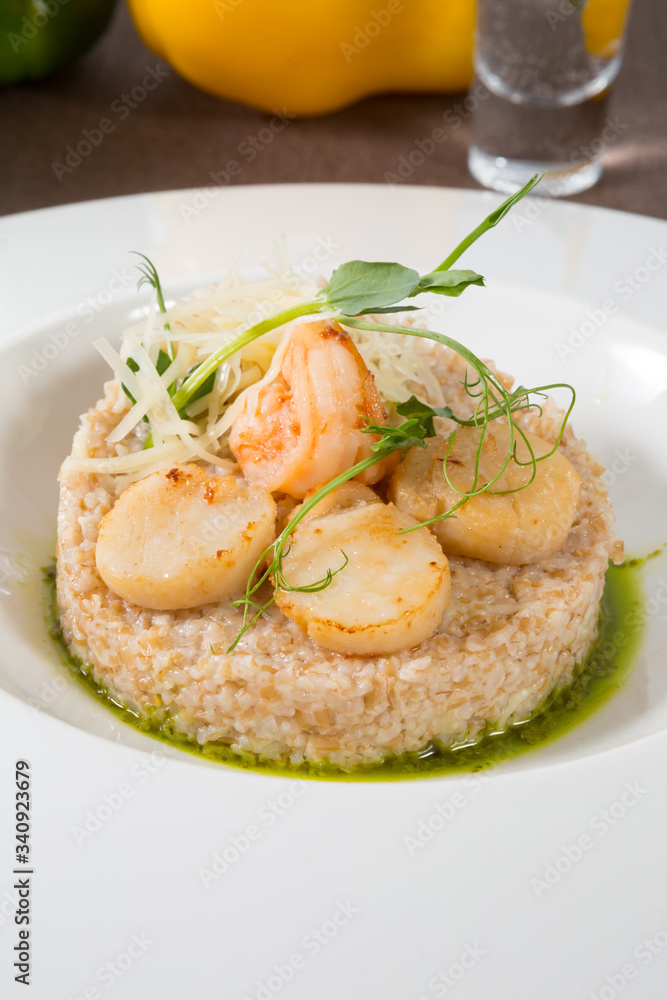Scallops and shrimps with garnish Scallops and shrimps with garnish