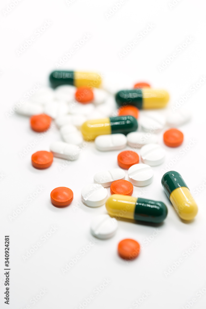 prescription pills on white background closeup
prescription pills on white background closeup