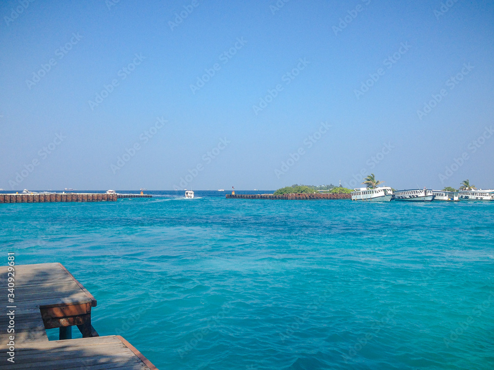 Male, Maldives ? February 10, 2017: Terminal of Male airport (MLE) in the Maldives. View from the pier to the beautiful sea.