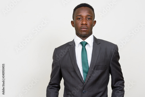 Portrait of young African businessman in suit