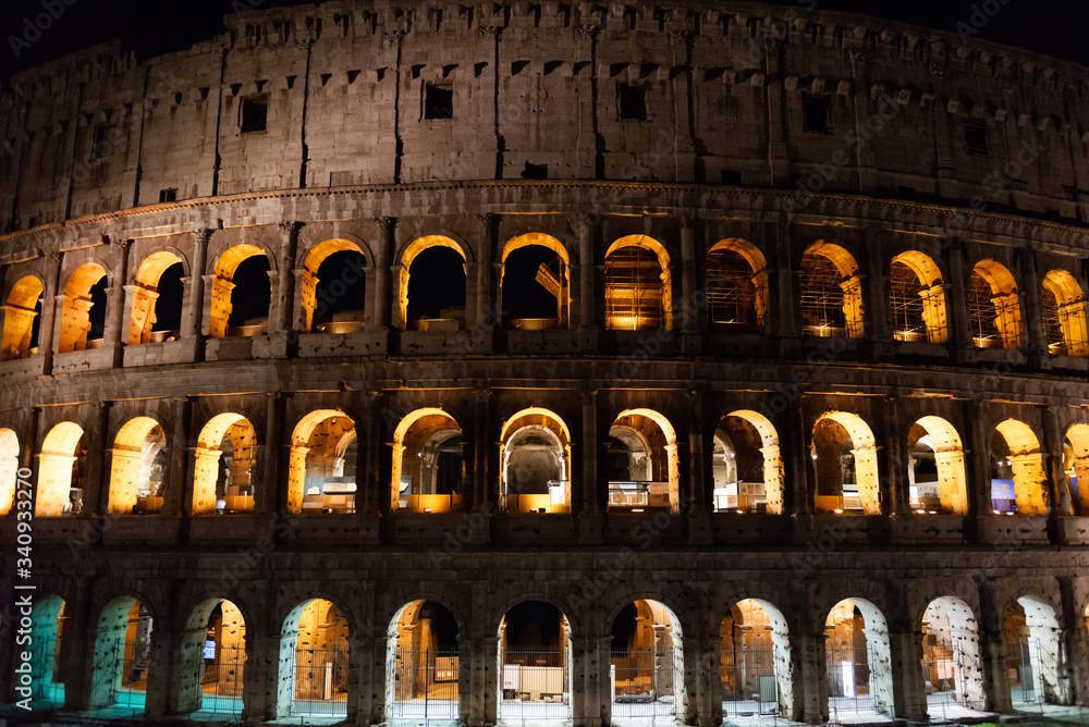 Night Colosseum with lighting. The main attraction of Rome in February 2020.