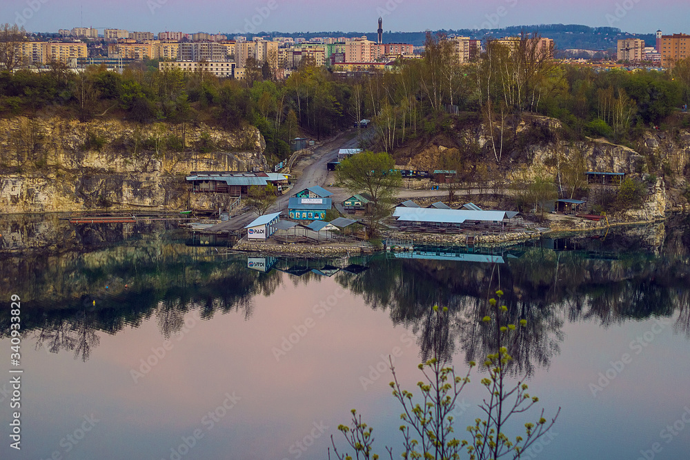 Obraz premium Diving center on the territory of the Twardowski rocks in Krakow, Poland At the bottom of lake the divers are awaited a flooded boat, bus and car