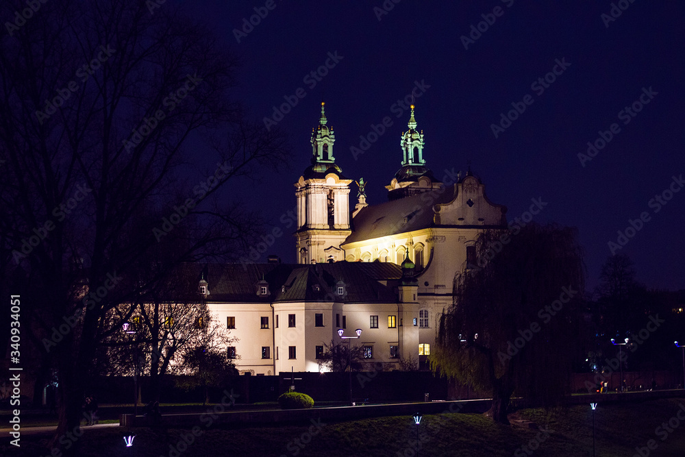 View from the Grunwaldzki bridge on church  near Vistula river at night.
Selective focus, long exposure
