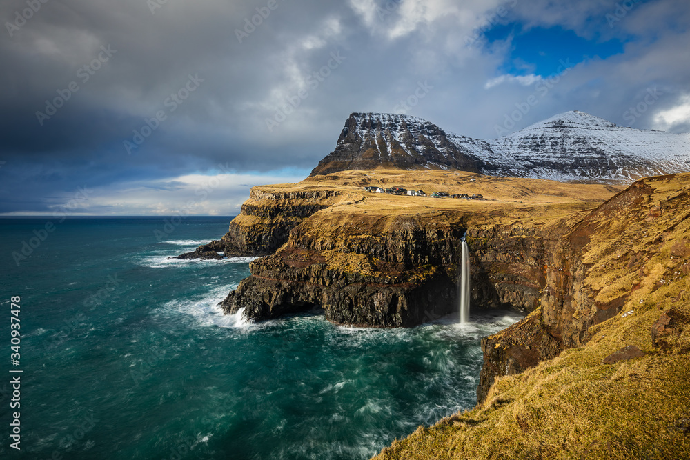 Mulafossur Waterfall on the island of Vagar on Faroe Islands